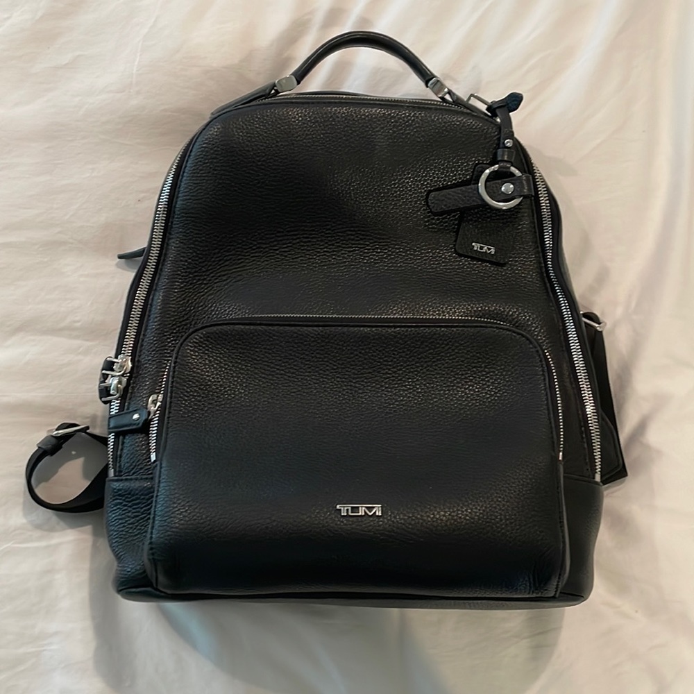 Tumi leather black backpack with zipper enclosures